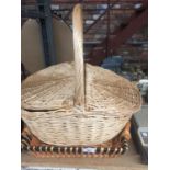 TWO WICKER BASKETS, ONE WITH A LID