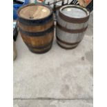 TWO MINIATURE WOODEN AND METAL BANDED SHERRY CASKS