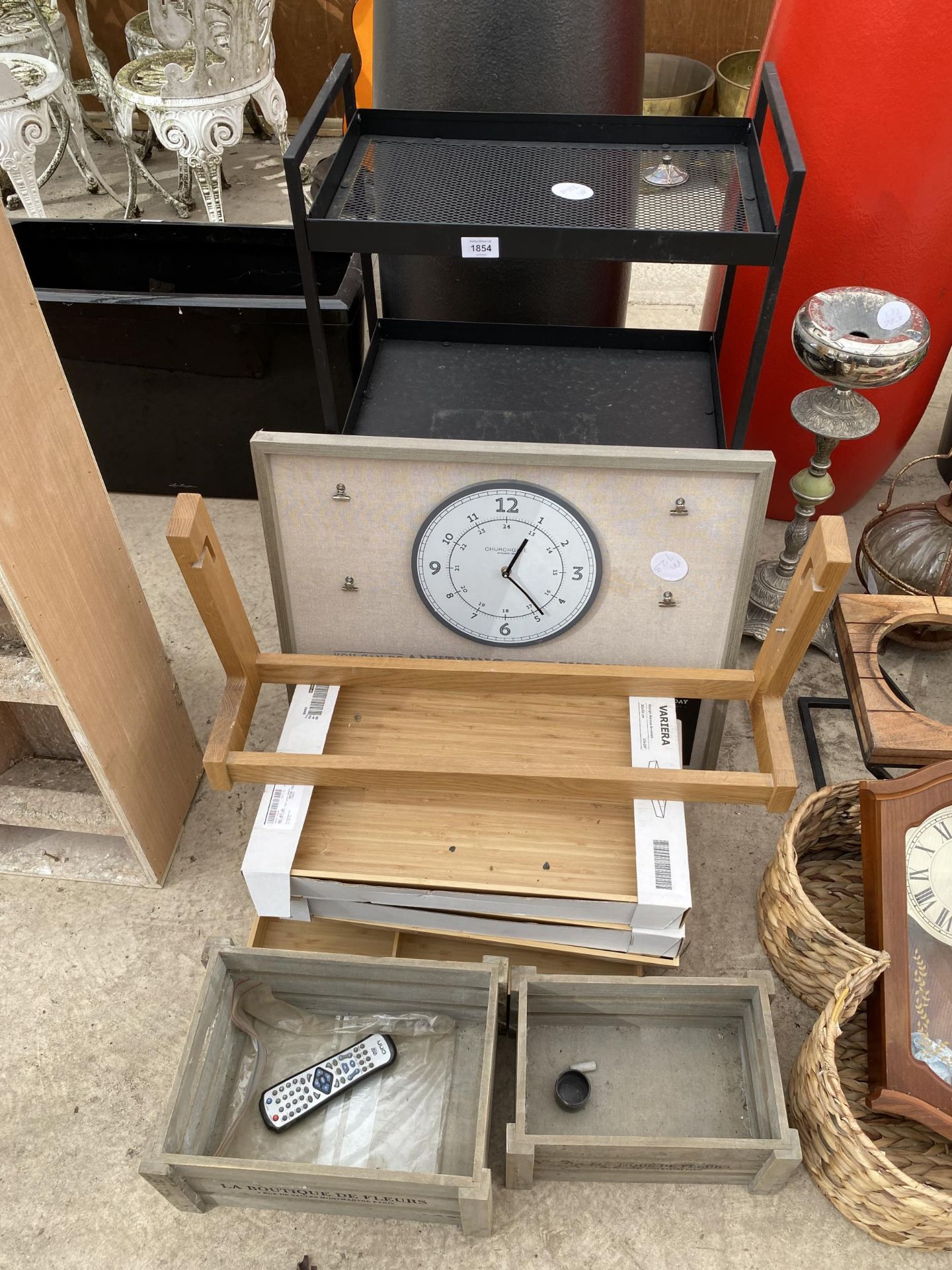 AN ASSORTMENT OF ITEMS TO INCLUDE TRAYS, A SHELVING UNIT AND A CLOCK ETC