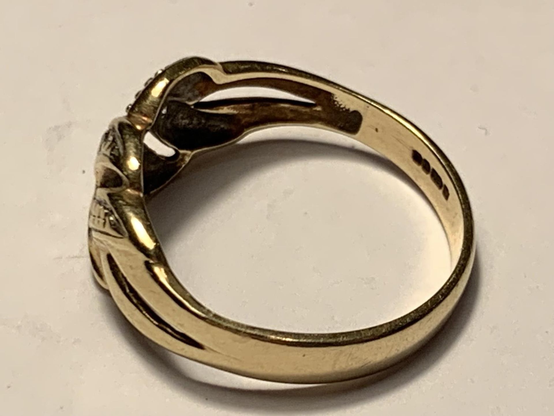 A 9 CARAT GOLD CROSSOVER RING WITH DIAMONDS SIZE L - Image 2 of 3