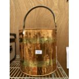 A VINTAGE AND DECORATIVE BRASS AND COPPER COAL BUCKET