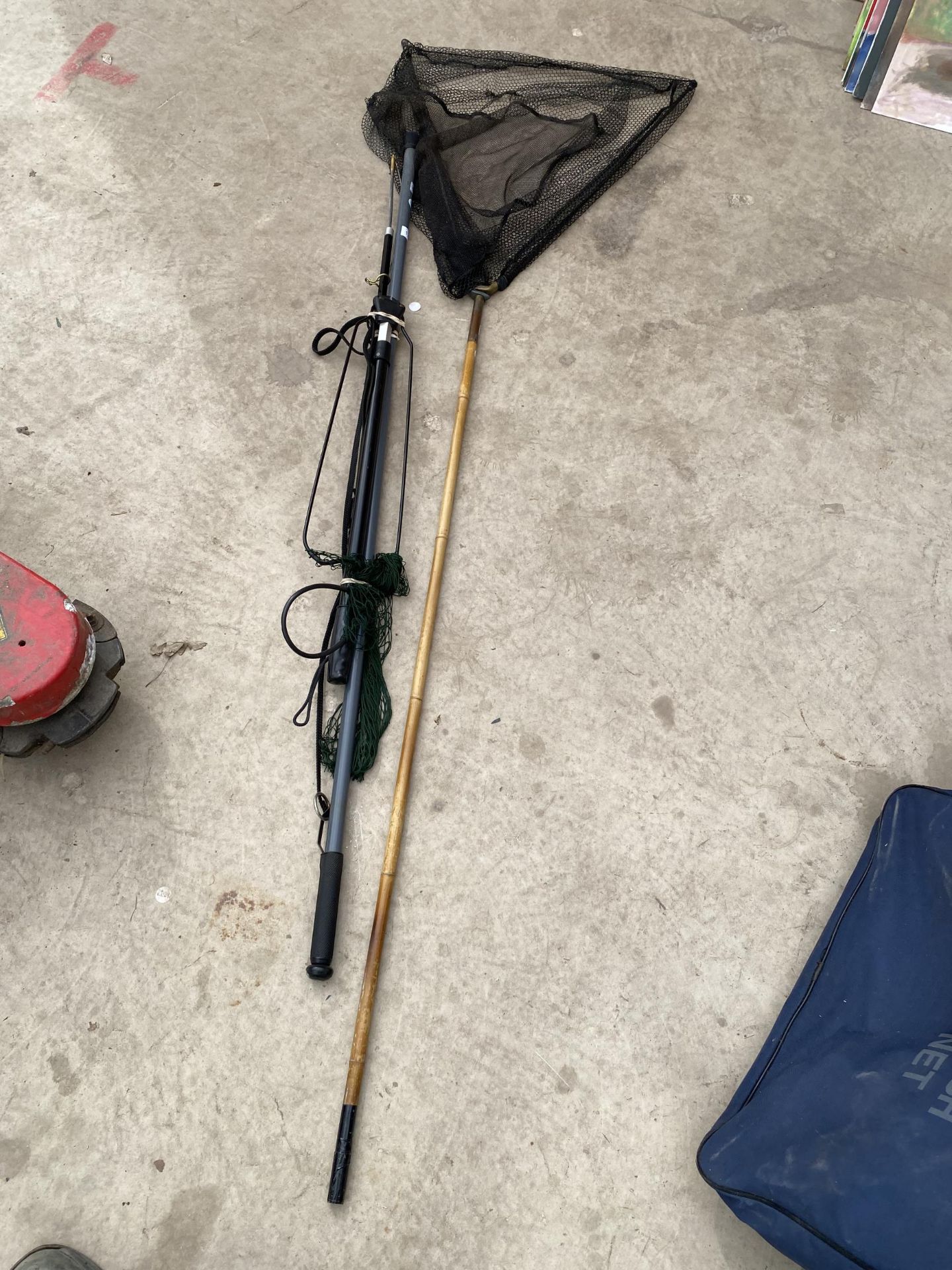 A CANE HANDLED FISHING NET, A WADING STAFF AUTOMATIC LANDING NET AND A SHARPES OF ABERDEEN SALMON