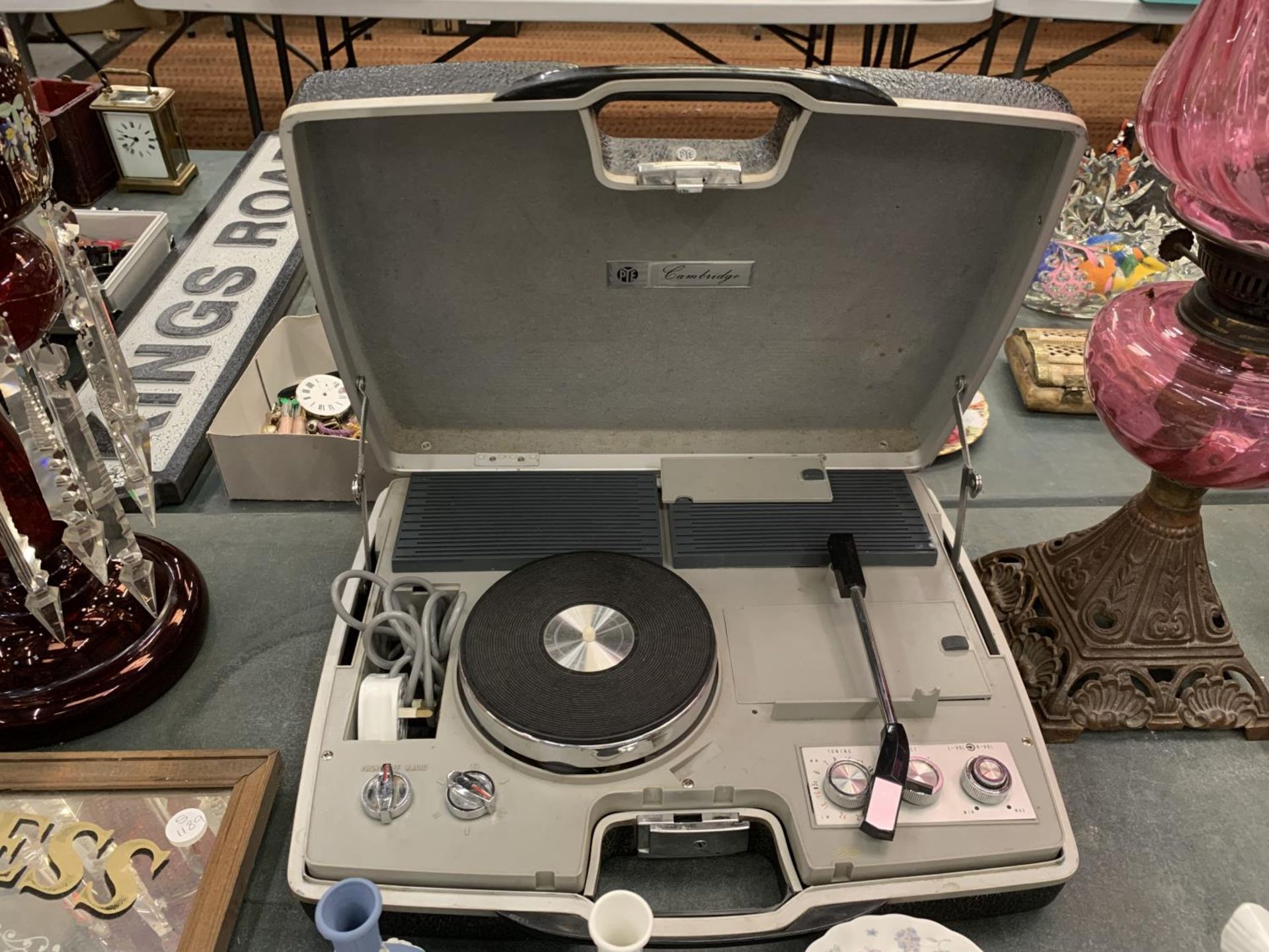 A VINTAGE PYE PORTABLE RECORD PLAYER IN A CASE