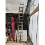 A TWELVE RUNG WOODEN LADDER AND AN ALUMINIUM 24 RUNG TWO SECTION EXTENDING LADDER