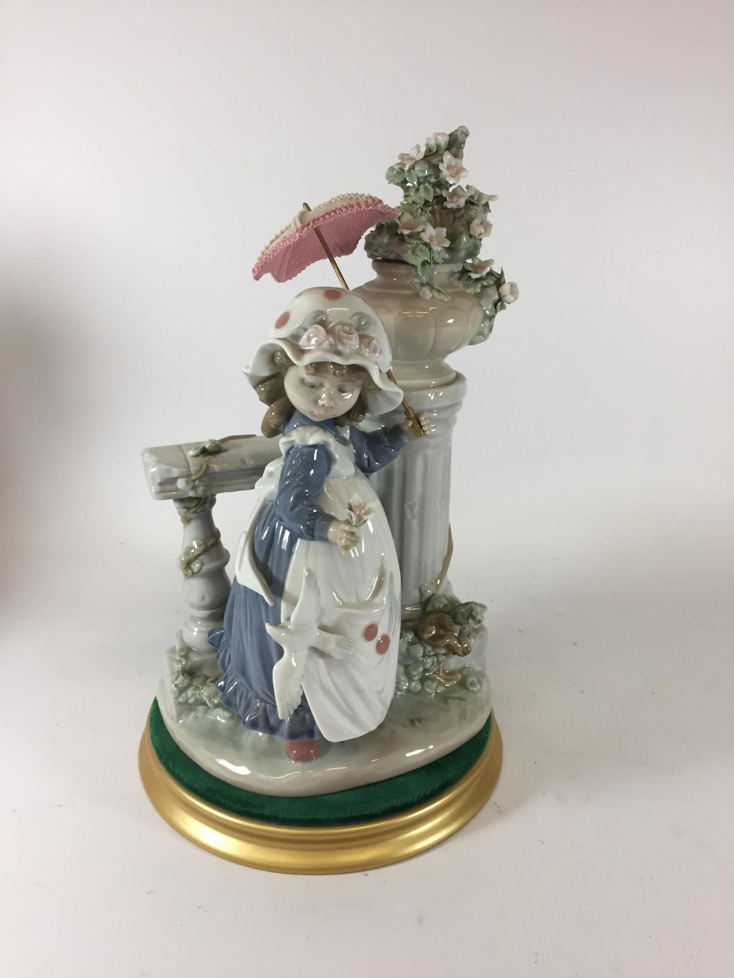 A LLADRO 'GLORIOUS SPRING' NO. 5284 FIGURE ON DISPLAY BASE