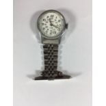 A SEKONDA NURSES WATCH SEEN WORKING BUT NO WARRANTY