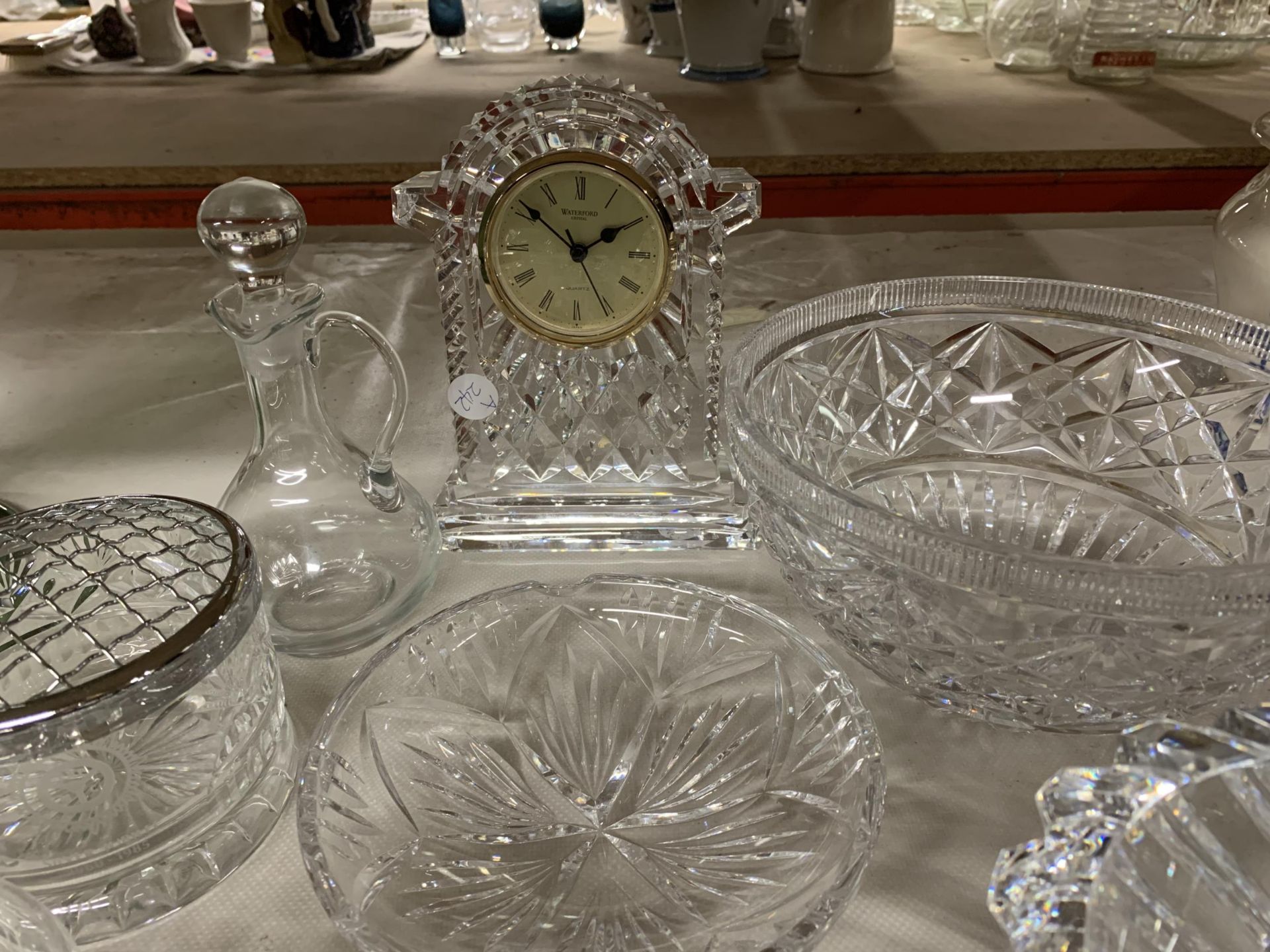 A QUANTITY OF CUT GLASS ITEMS TO INCLUDE A WATERFORD CRYSTAL CLOCK, ORREFORS GLASSBOWL - CHIP TO THE - Image 2 of 3