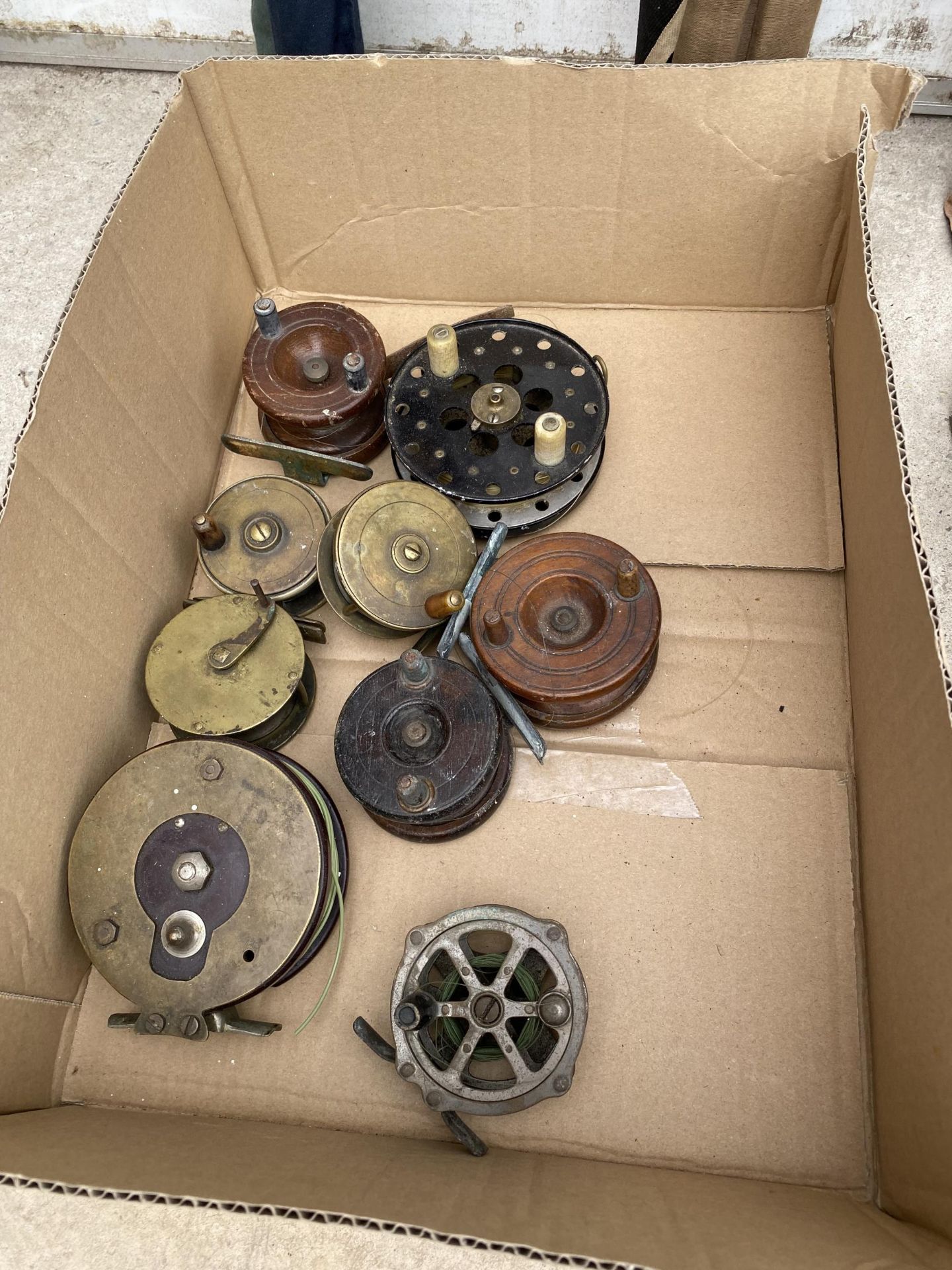 NINE VARIOUS VINTAGE FISHING REELS