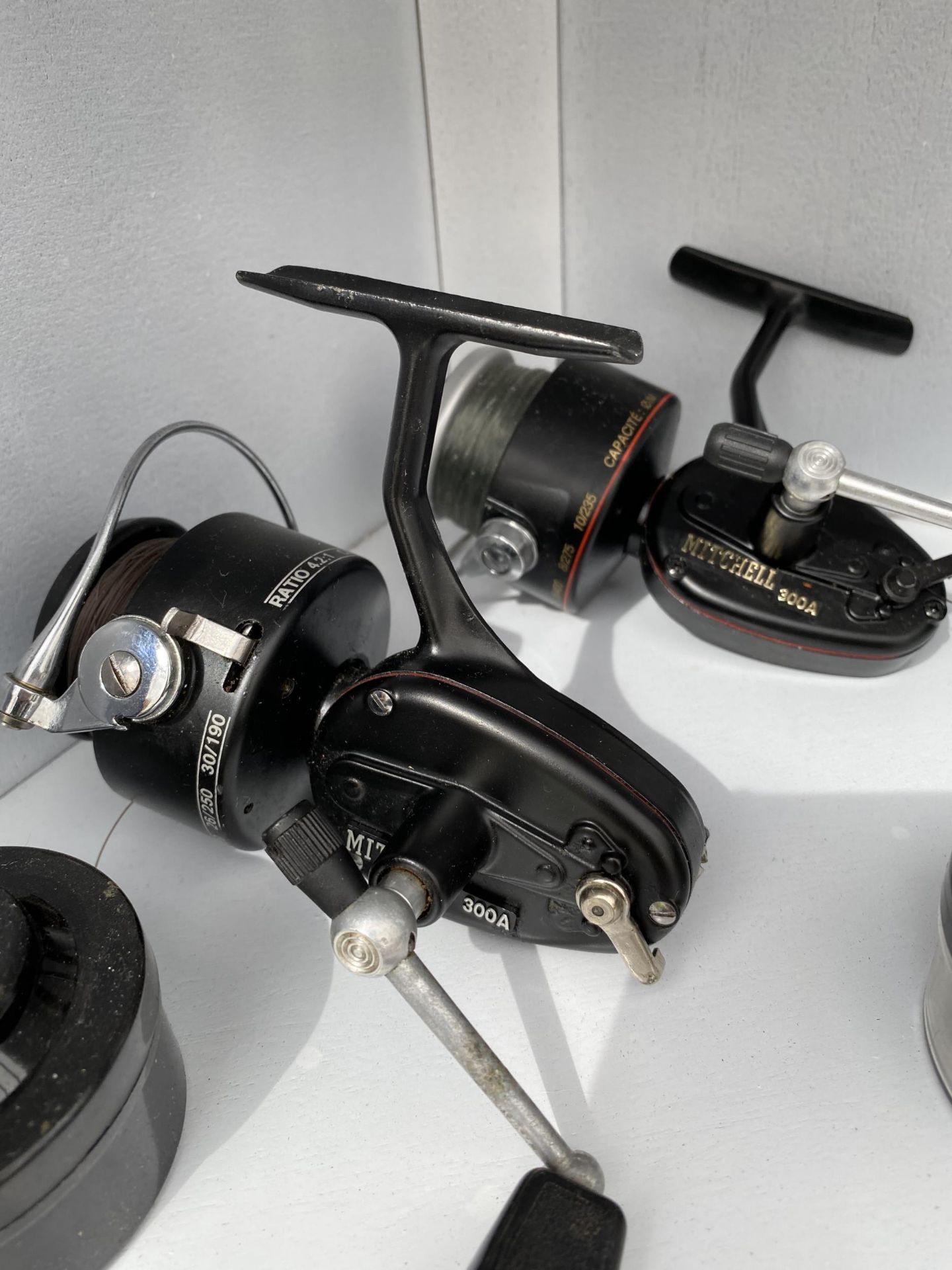 THREE MITCHELL FIXED SPOOL FISHING REELS CONSISTING OF TWO 300A WITH SPARE SPOOLS AND A 308 PRINCE - Image 2 of 4