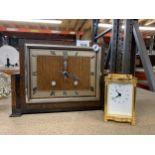 AN ART DECO OAK CHIMING MANTLE CLOCK AND FURTHER CHURCHILL QUARTZ CARRIAGE CLOCK