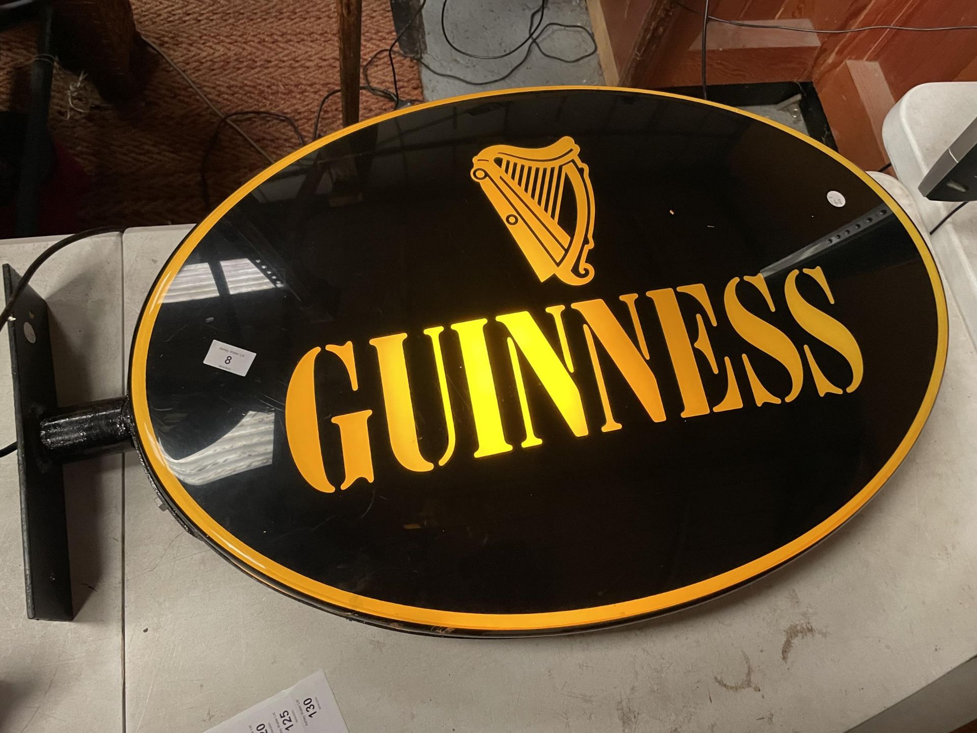A LARGE ILLUMINATED 'GUINNESS' SIGN, 84CM INCLUDING BRACKET