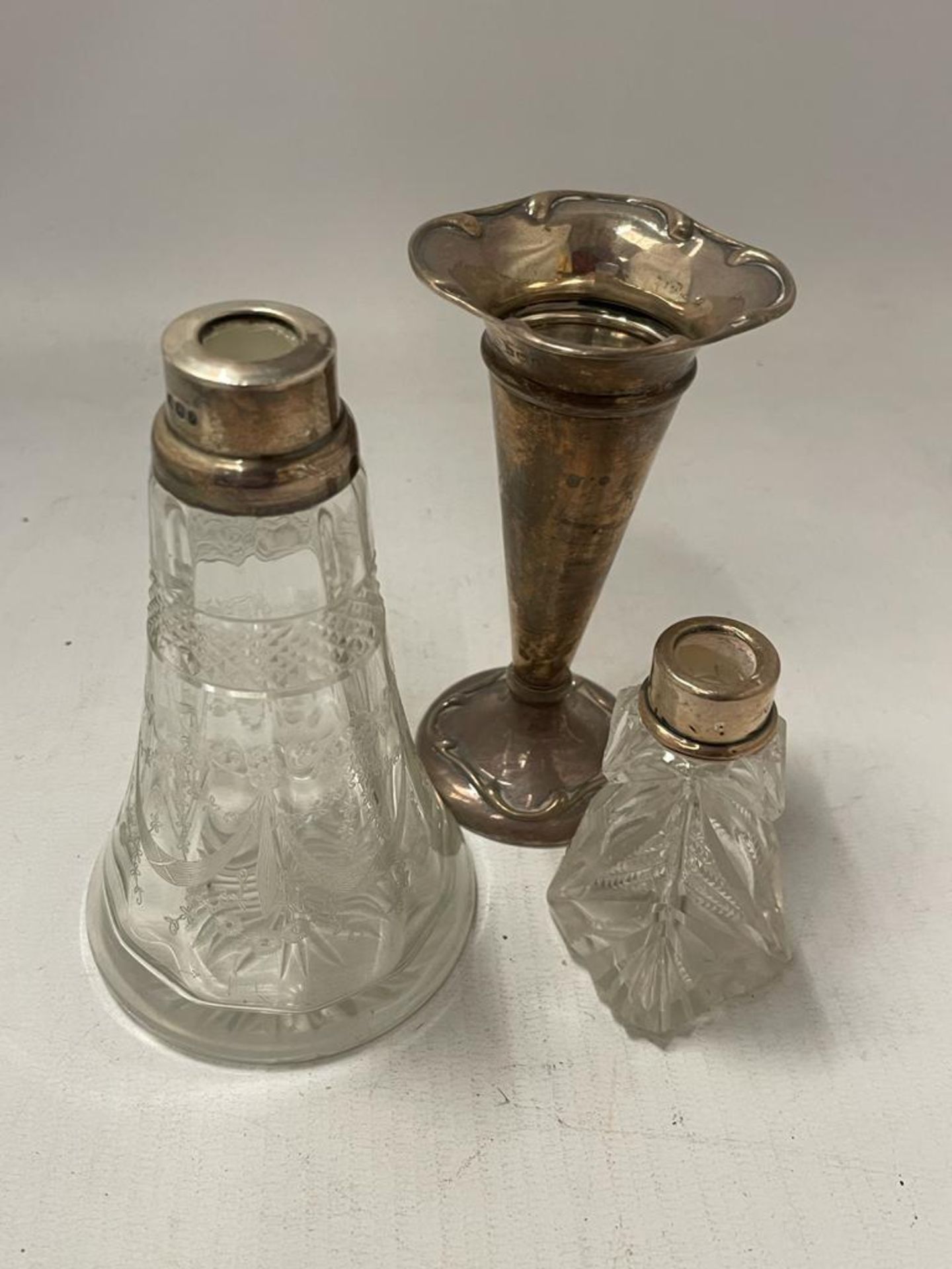 THREE HALLMARKED SILVER ITEMS - PERFUME BOTTLES AND A POSY VASE