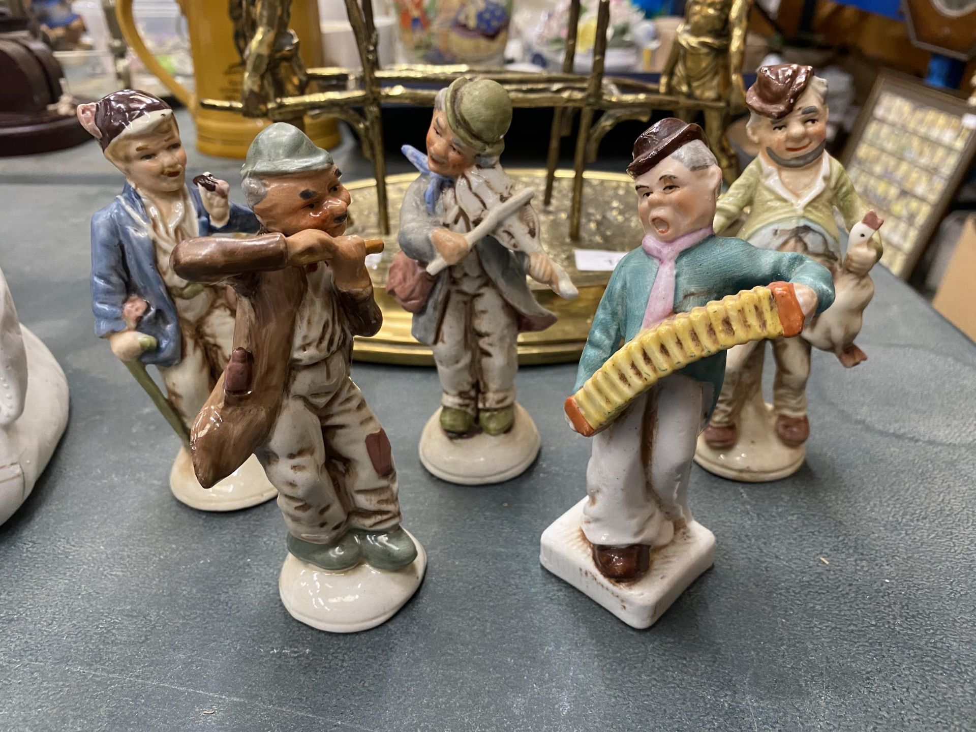 A QUANTITY OF CONTINENTAL POTTERY FIGURES - 5 IN TOTAL HEIGHT 13CM