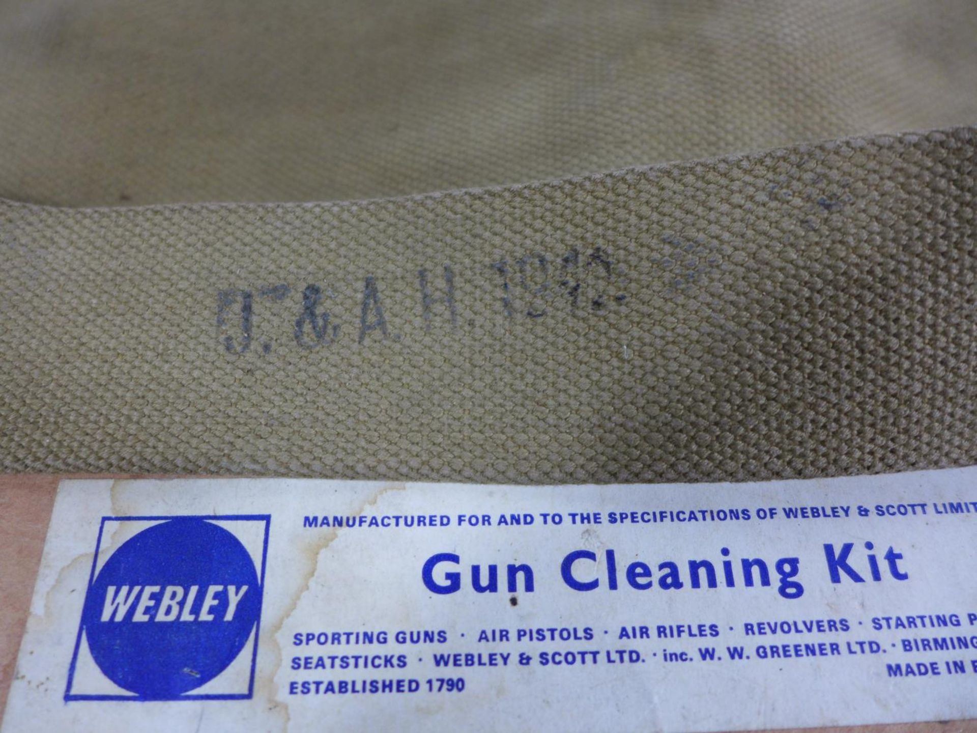 A CANVAS SLIP CASE FOR A 1942 MARK III SNIPERS RIFLE AND A WEBLEY UNUSED GUN CLEANING KIT (2) - Image 2 of 4