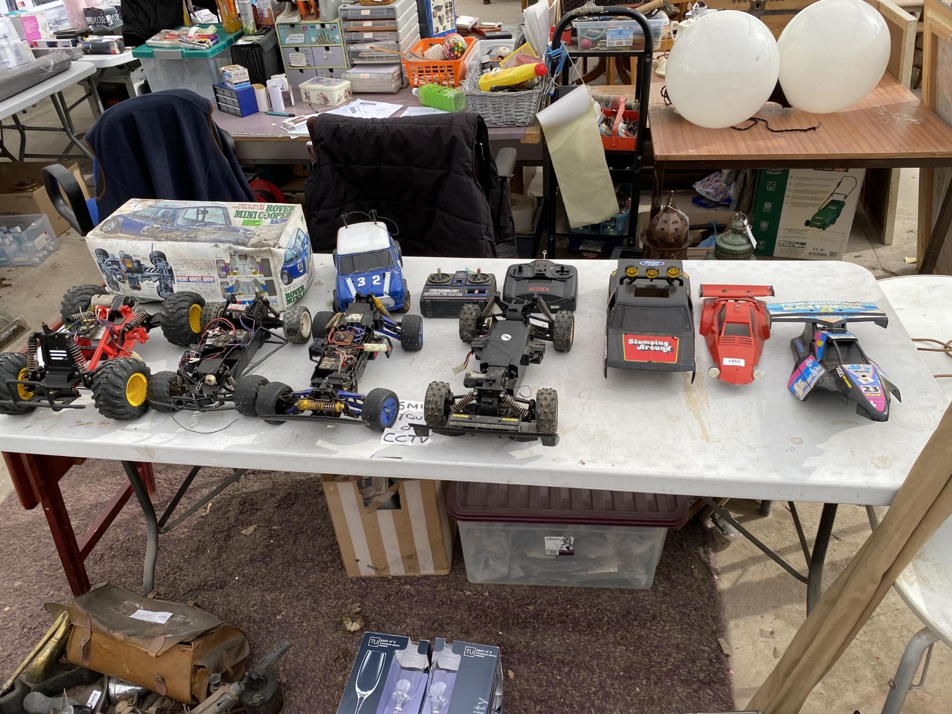 A LARGE ASSORTMENT OF REMOTE CONTROL CAR PARTS FOR RESTORATION