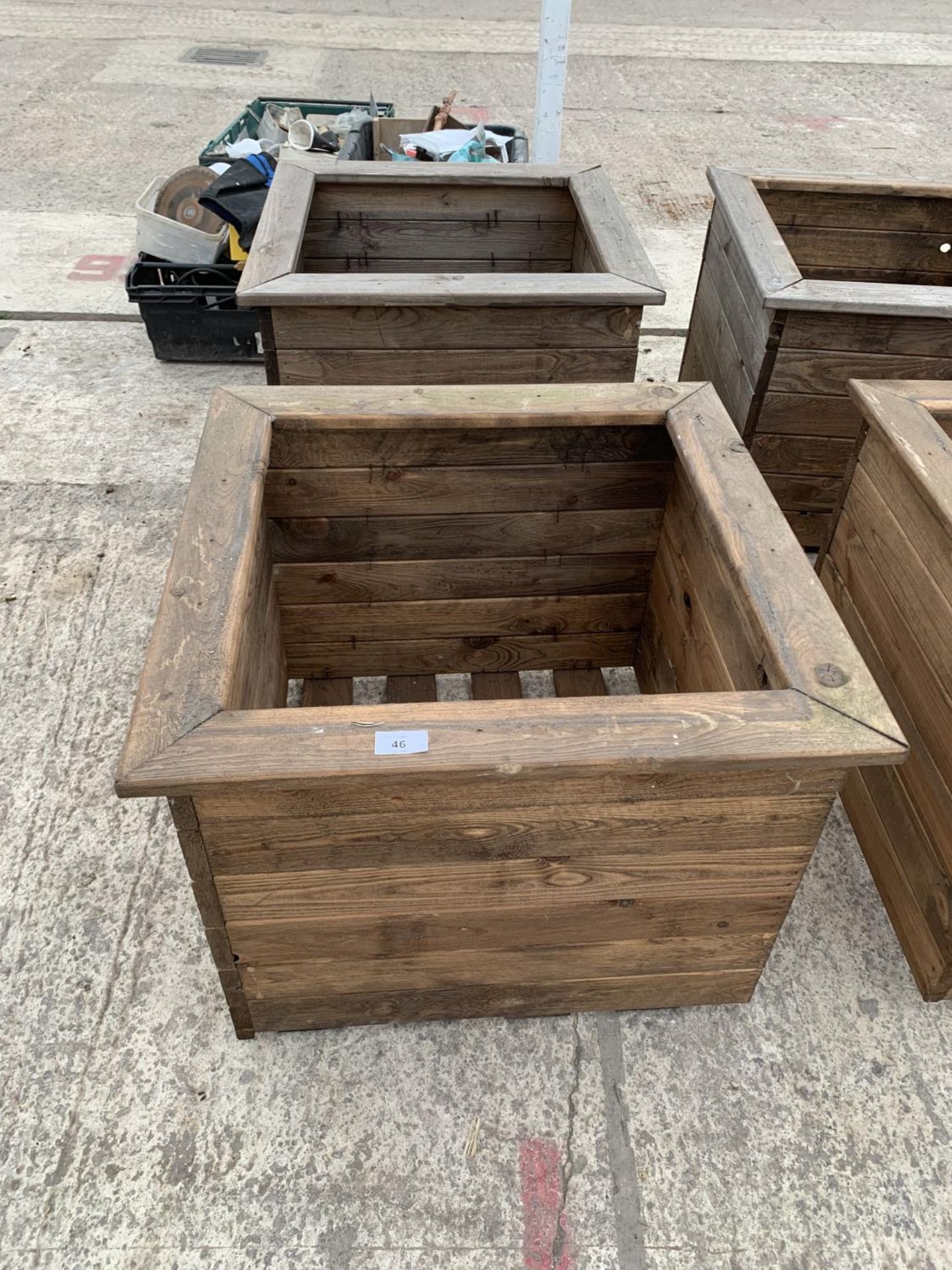 TWO LARGE SQUARE WOODEN PLANTERS - HEIGHT 46CM, WIDTH 57CM, DEPTH 57CM - NO VAT