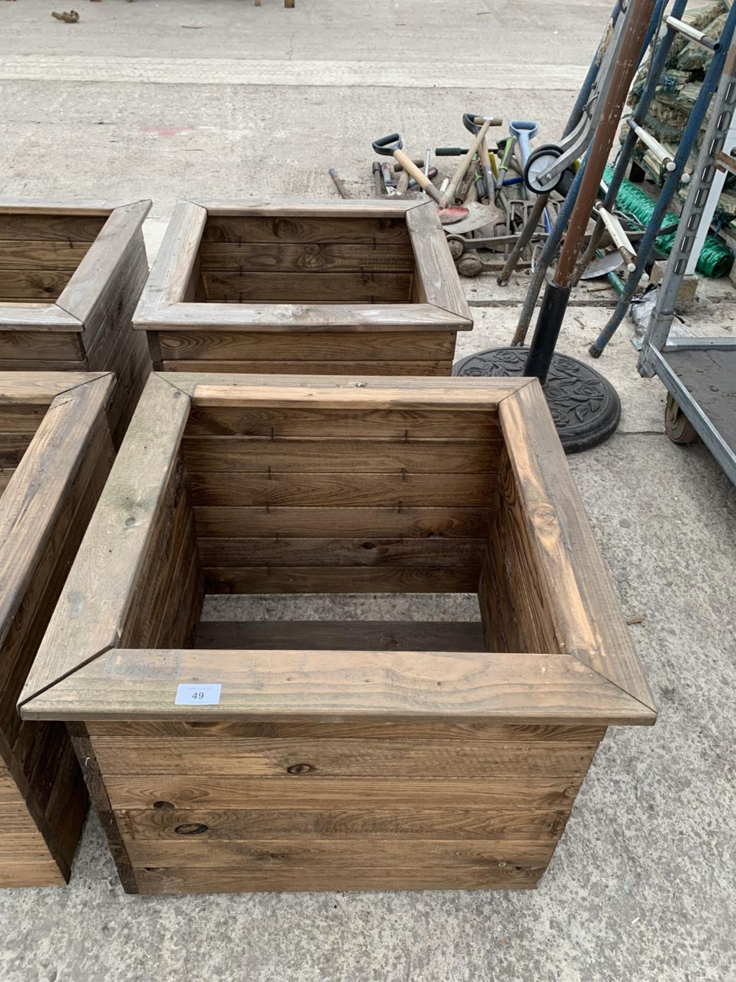 TWO LARGE SQUARE WOODEN PLANTERS HEIGHT 46CM, WIDTH 57CM, DEPTH 57CM - NO VAT