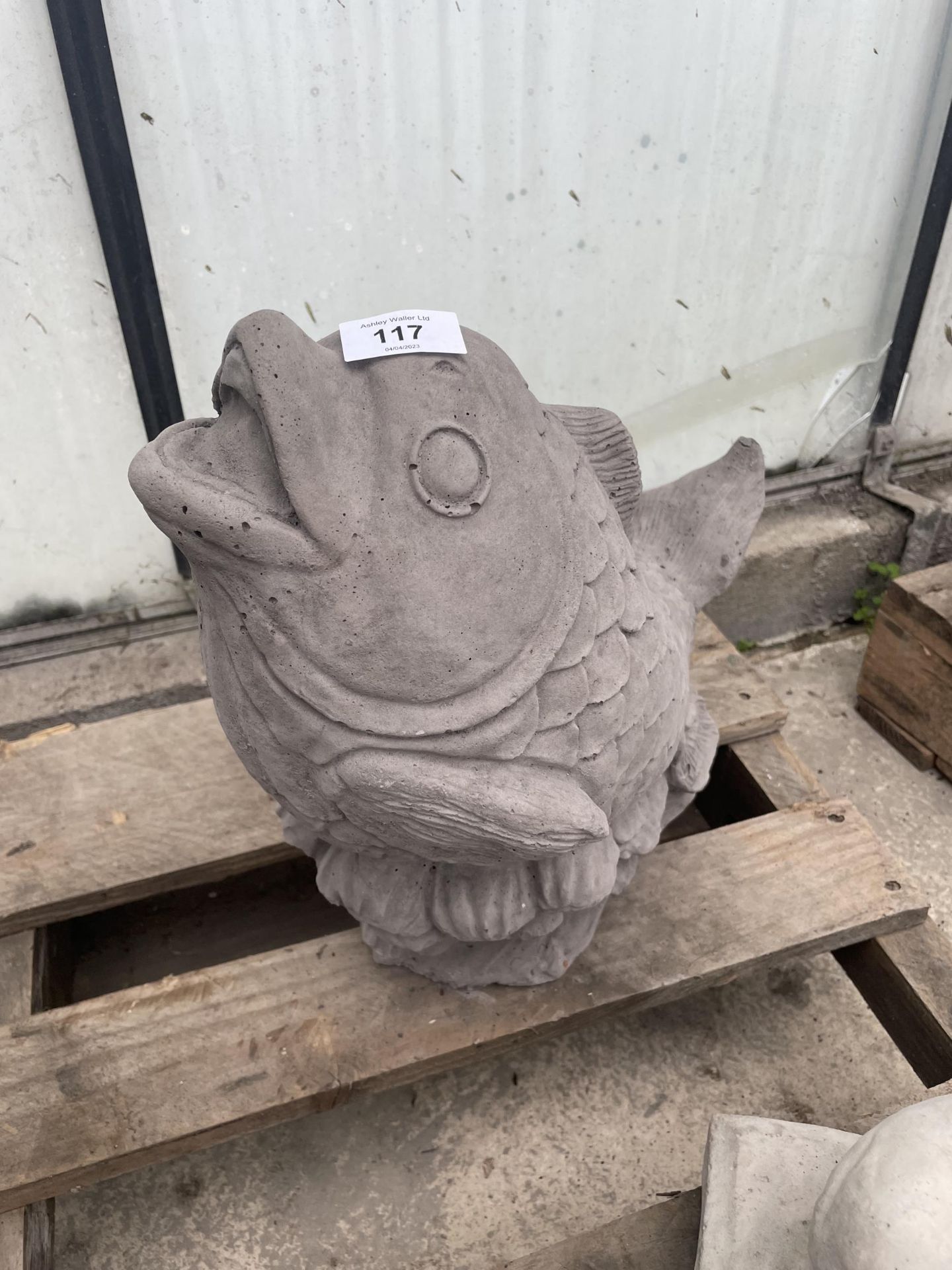 A CONCRETE ORNAMENT OF A KOI CARP NO VAT