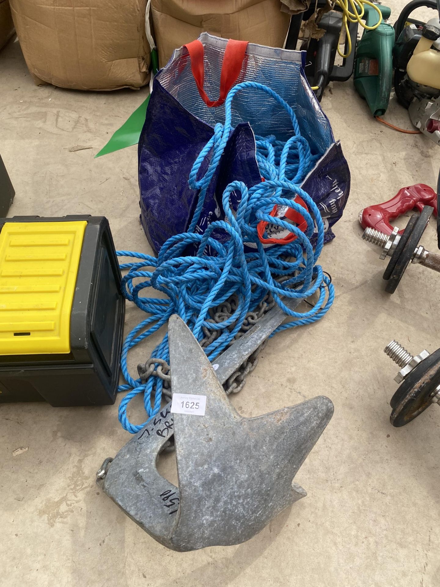 A METAL BOAT ANCHOR AND A QUANTITY OF ROPE