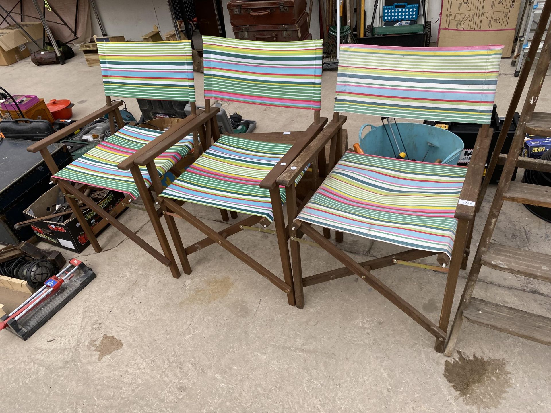 THREE FOLDING DIRECTORS STYLE CHAIRS