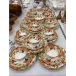 A LARGE QUANTITY OF ROYAL WINDSOR CHINA CUPS, SAUCERS AND SIDE PLATES PLUS A CREAM JUG AND SUGAR