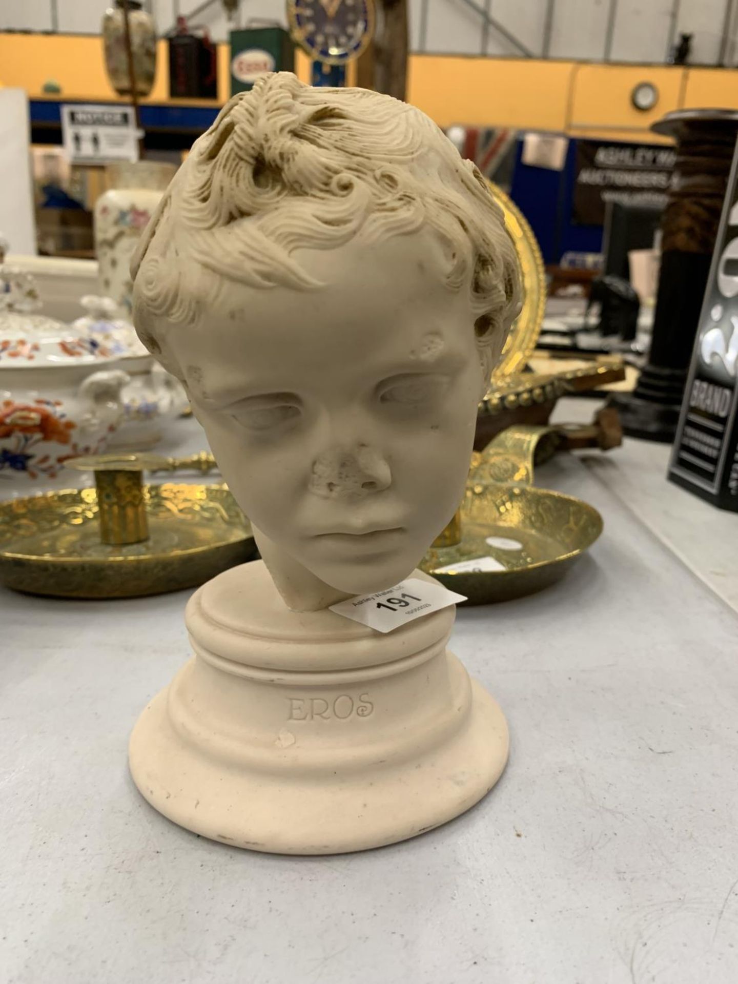 A BUST OF THE HEAD OF EROS HEIGHT 17CM