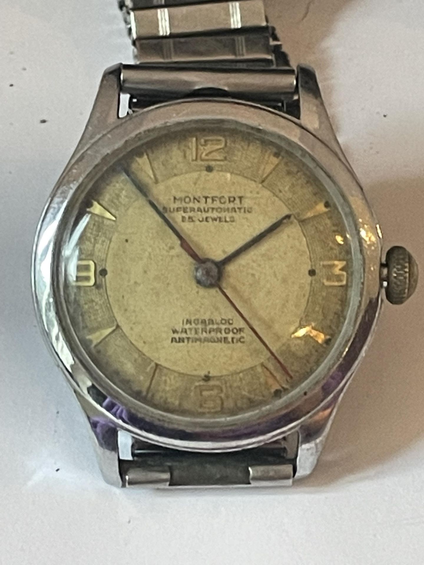 A MONFORT SUPER AUTOMATIC GENTS WRIST WATCH