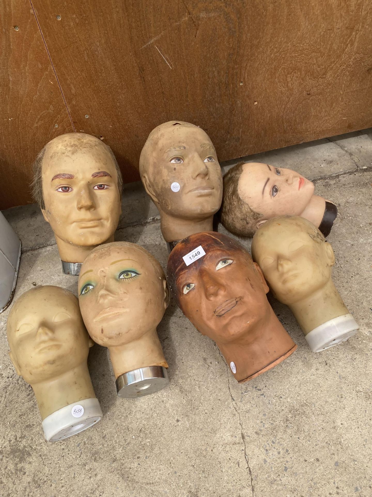 SEVEN VINTAGE MANEQUIN HEADS