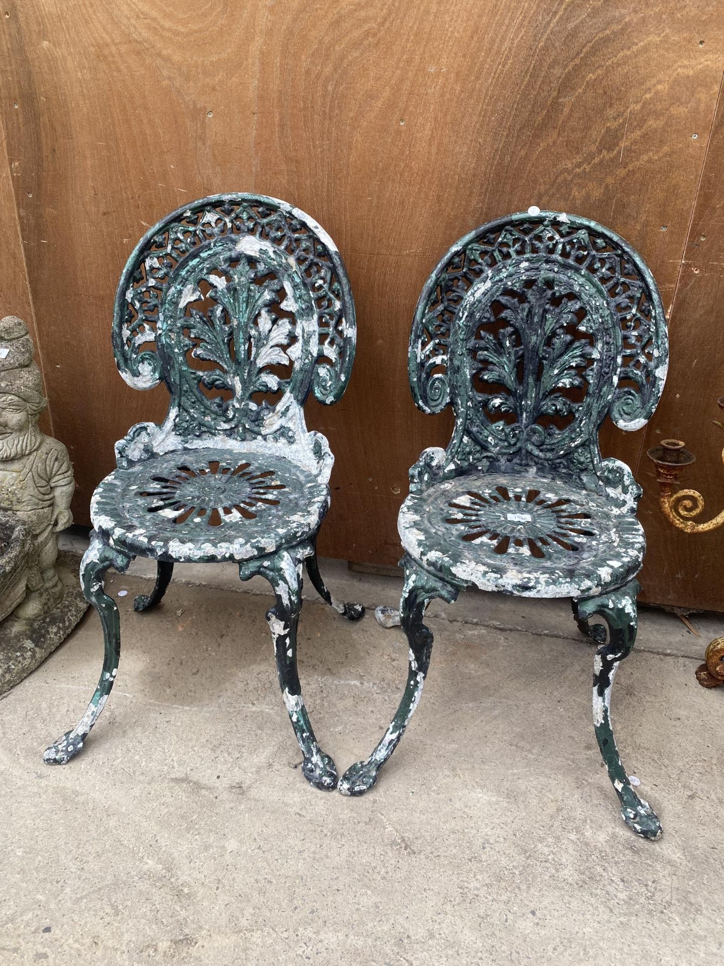A PAIR OF VINTAGE CAST ALLOY BISTRO CHAIRS