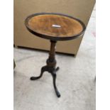 A SMALL MAHOGANY TRIPOD WINE TABLE