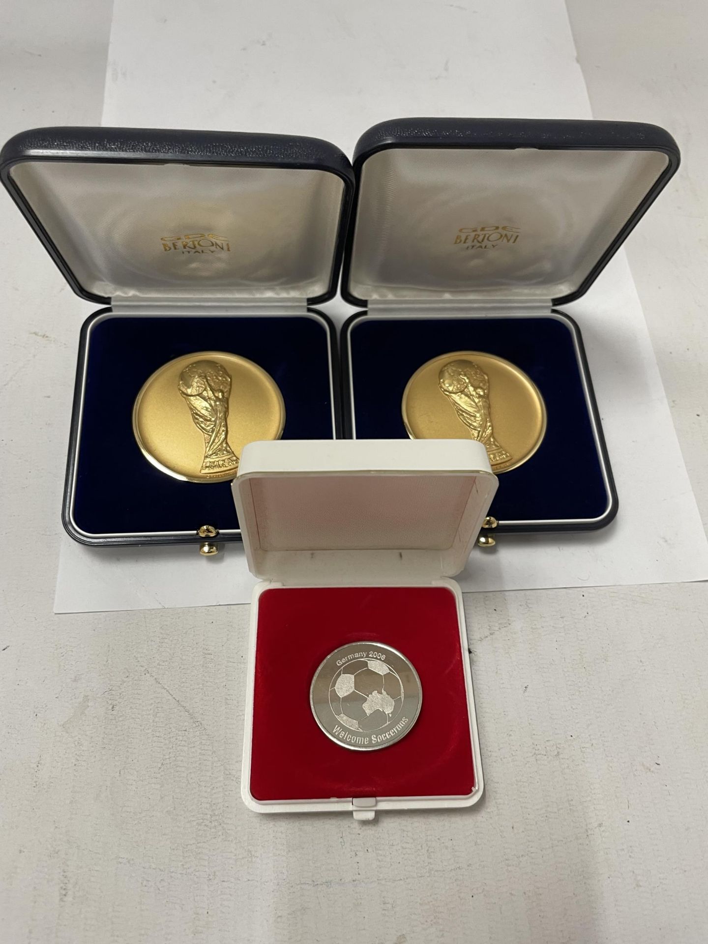 TWO CASED 2006 FIFA WORLD CUP PARTICIPANT FINAL COMPETITION MEDALS BY BERTONI, ITALY AND FURTHER