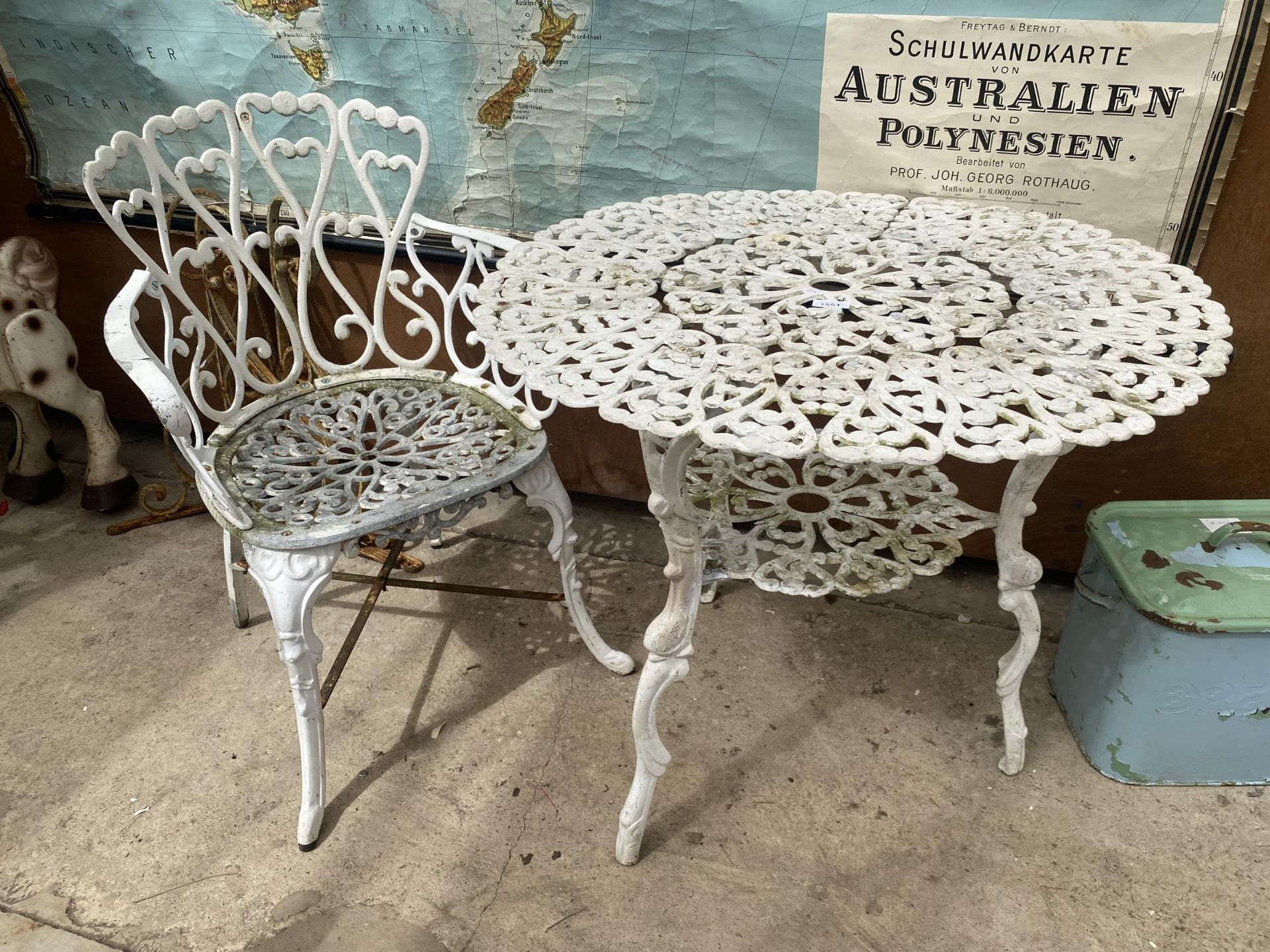 A VINTAGE CAST ALLOY GARDEN TABLE AND ARM CHAIR