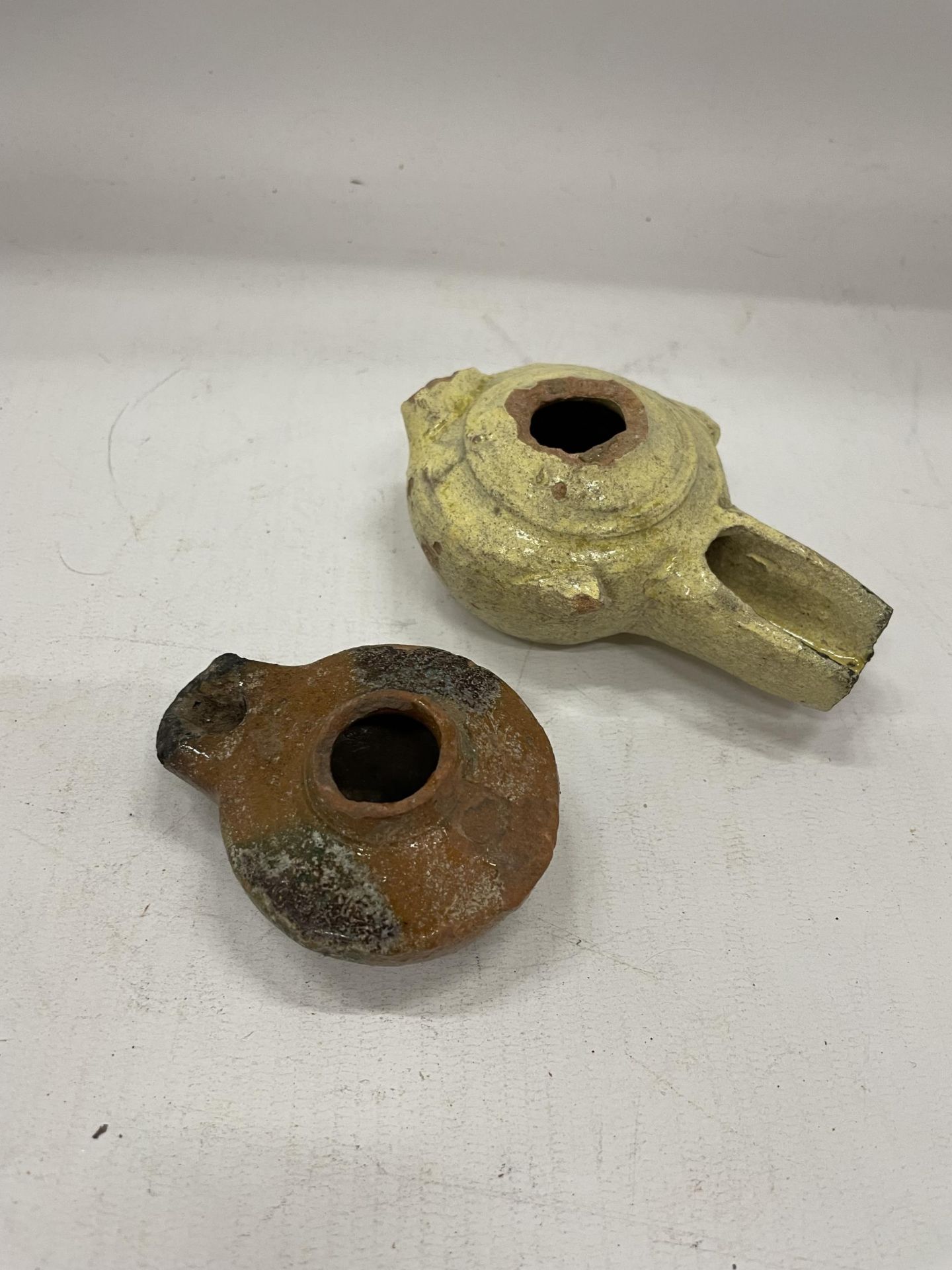 A PAIR OF FATAMID CALIPHATE PERIOD (C.900-1100 AD) GLAZED OIL LAMPS UNEARTHED IN 1926 ARCHAEOLOGICAL - Image 2 of 4