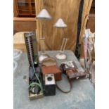 AN ASSORTMENT OF ITEMS TO INCLUDE A KODAK CAMERA, A BLOOD PRESSURE TESTER AND TWO LAMPS ETC