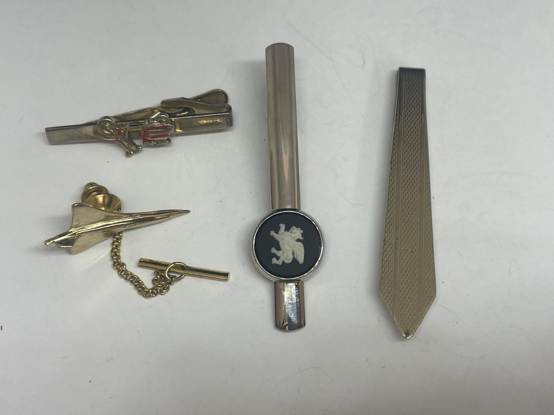 FOUR TIE PINS TO INCLUDE A CONCORDE