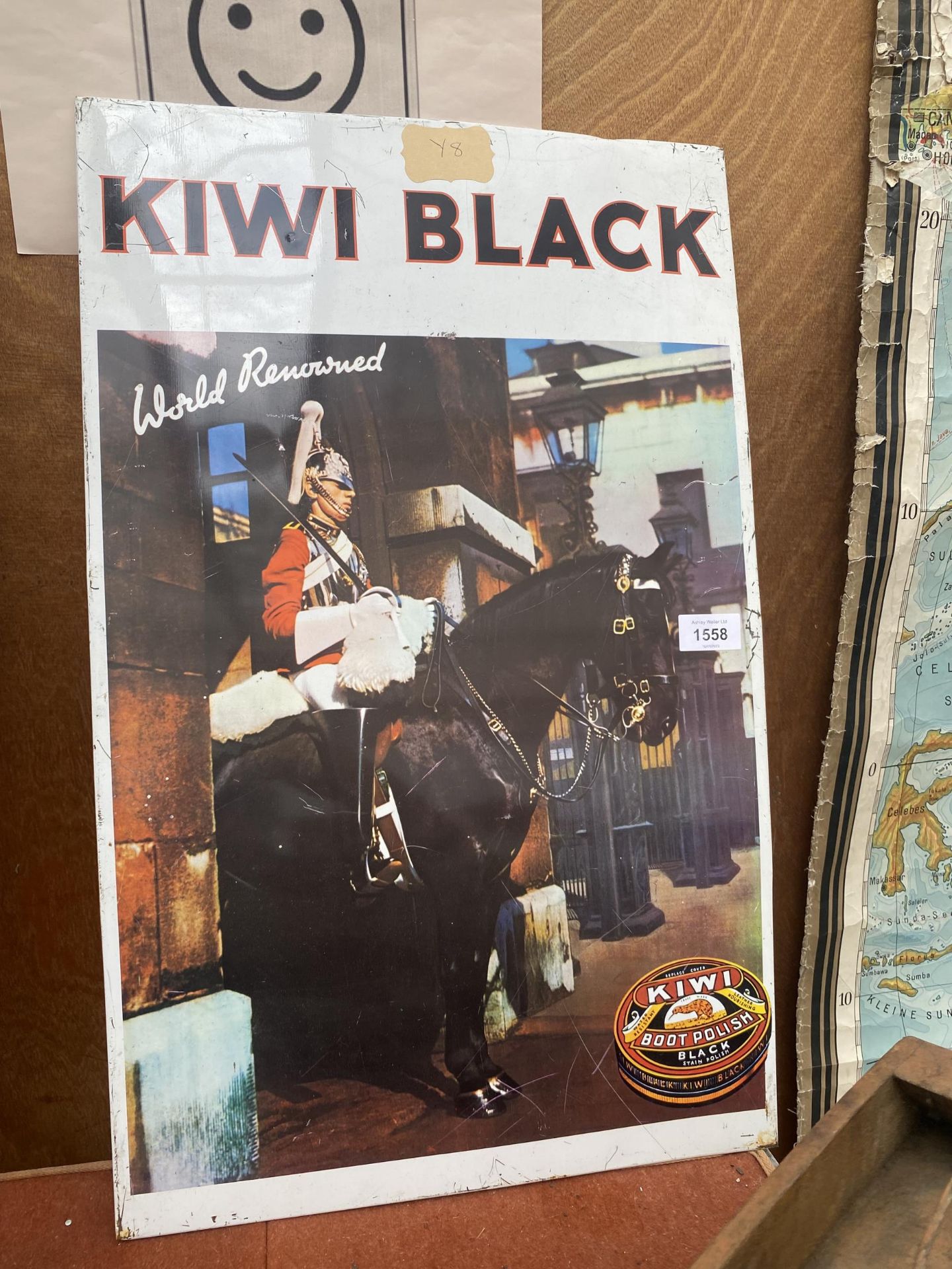 A TIN 'KIWI BOOT POLISH' SIGN