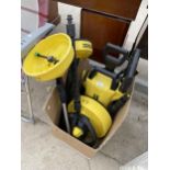 A KARCHER K2 PRESSURE WASHER AND VARIOUS ATTATCHMENTS