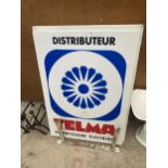 AN ILLUMINATED DOUBLE SIDED 'TELMA' SIGN COMPLETE WITH WALL BRACKET
