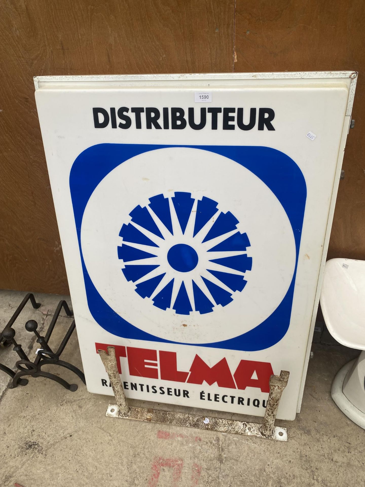 AN ILLUMINATED DOUBLE SIDED 'TELMA' SIGN COMPLETE WITH WALL BRACKET