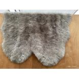 A MODERN GREY SHAGGY RUG