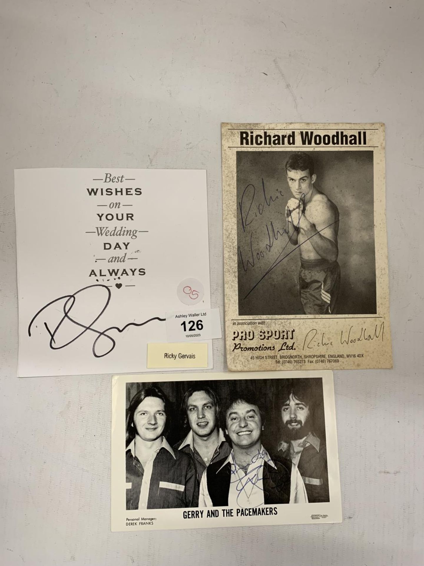 THREE PIECES OF SIGNED MEMORIBILIA - GERRY MARSDEN, RICKY GERVAISE AND BOXER RICHIE WOODHALL - NO