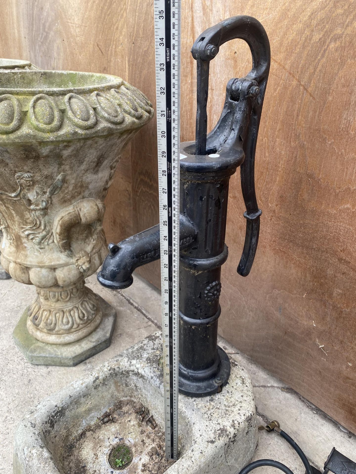 A VINTAGE CAST IRON WATER PUMP WITH A STONE TROUGH TO BASE - Image 2 of 3