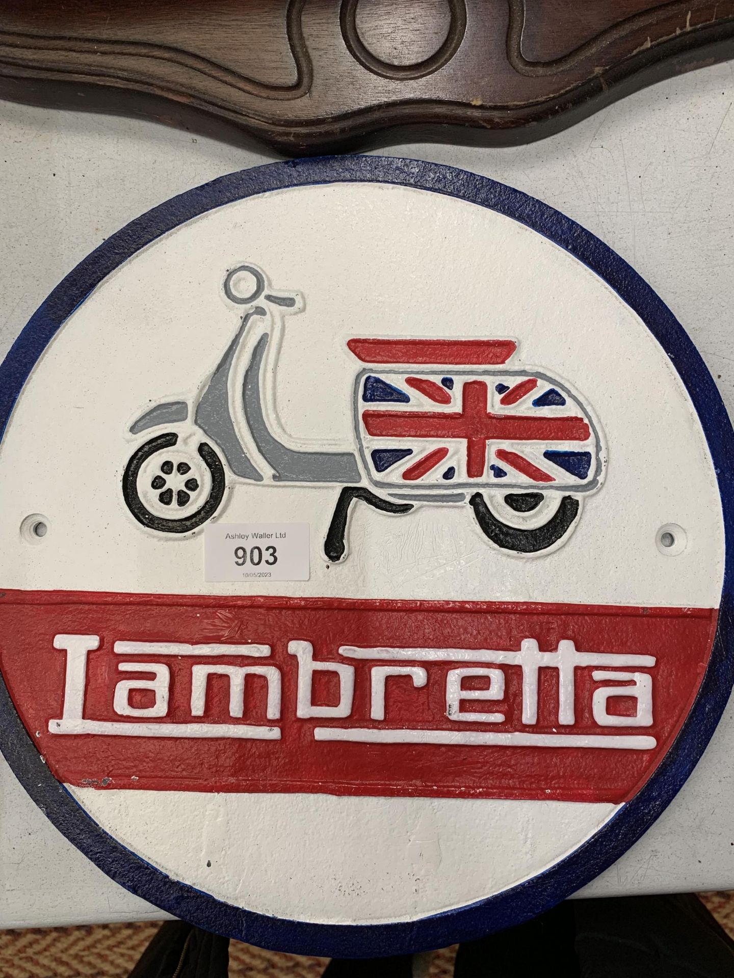 A CAST LAMBRETTA SCOOTER SIGN