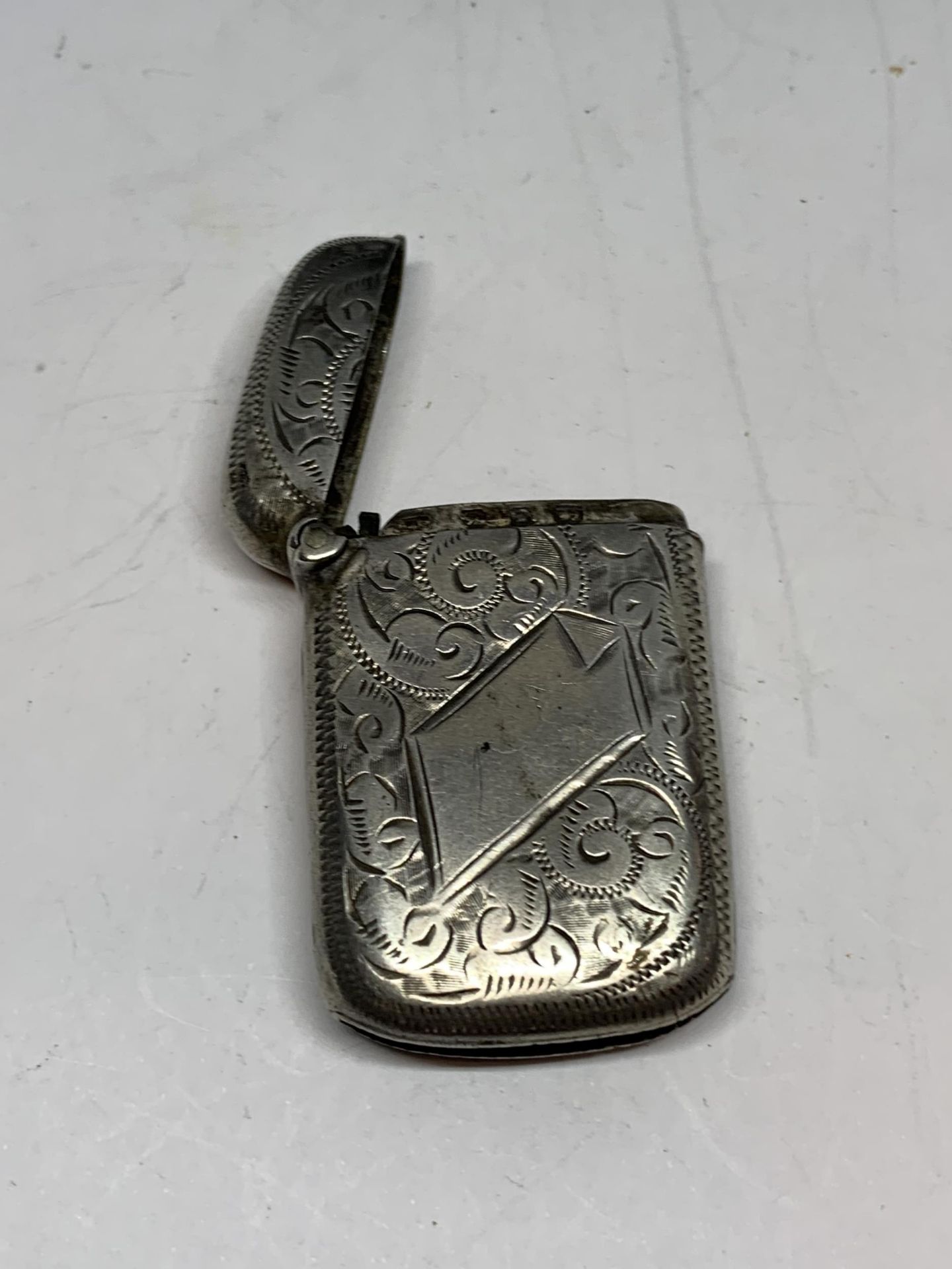 A SILVER VESTA CASE