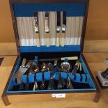 A VINTAGE WOODEN CASED CANTEEN OF CUTLERY