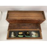 A SET OF VINTAGE GLASS LANTERN SLIDES IN A BOX