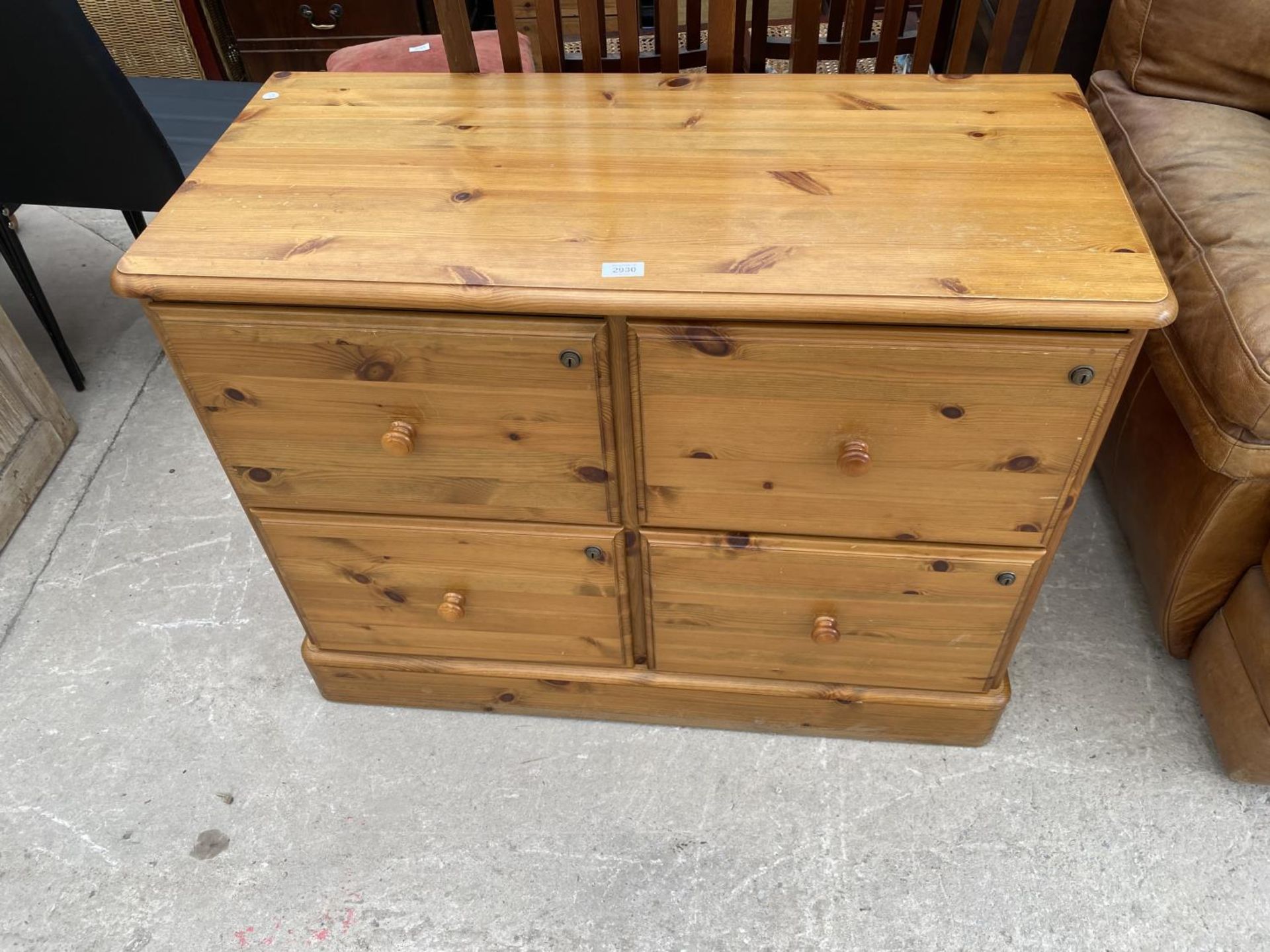 A MODERN PINE FOUR DRAWER FILING CABINET, 38" WIDE
