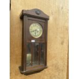 A WOODEN VIENNA STYLE WALL CLOCK