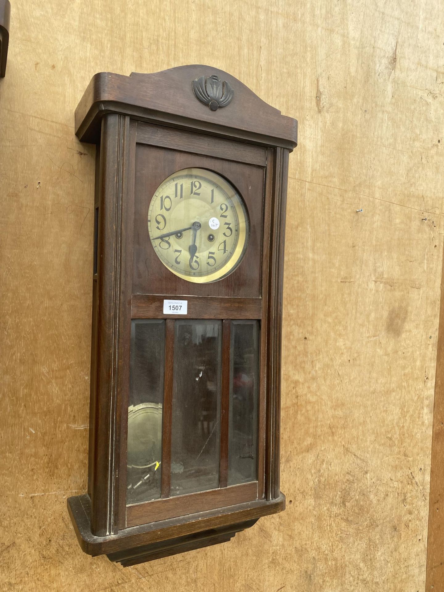 A WOODEN VIENNA STYLE WALL CLOCK