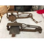 TWO VINTAGE METAL BEAR TRAPS